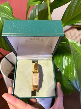Gucci Gold-Tone Slim Bangle Watch with Champagne Dial
